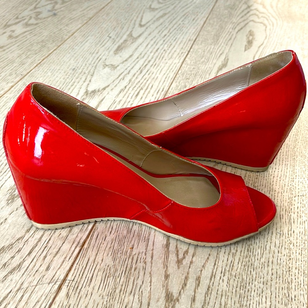 Patent leather red wedges by Aquatalia